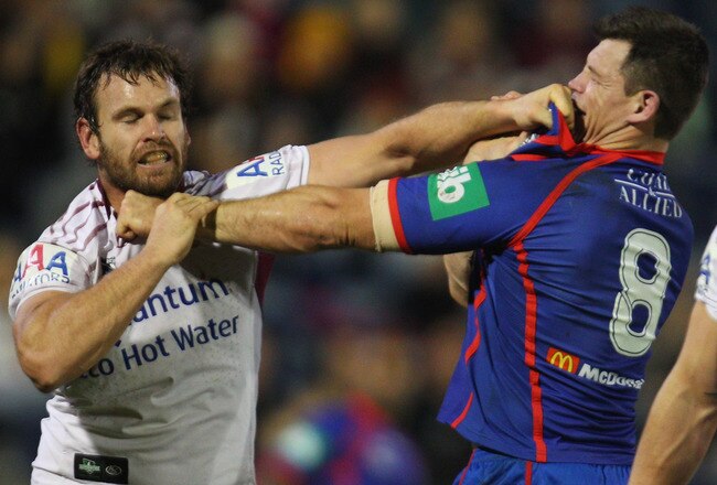 NEWCASTLE, AUSTRALIA - AUGUST 02:  Josh Perry of the Eagles and Ben Cross of the Knight exchange heated words during the round 21 NRL match between the Newcastle Knights and the Manly Sea Eagles at EnergyAustralia Stadium on August 2, 2010 in Newcastle, Australia.  (Photo by Mark Kolbe/Getty Images)