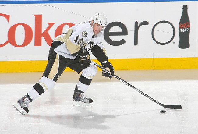 BUFFALO, NY - NOVEMBER 24:  Mike Comrie #19 of the Pittsburgh Penguins skates against of the Buffalo Sabres  at HSBC Arena  on November 24, 2010 in Buffalo, New York. Pittsburgh won 1-0.  (Photo by Rick Stewart/Getty Images)
