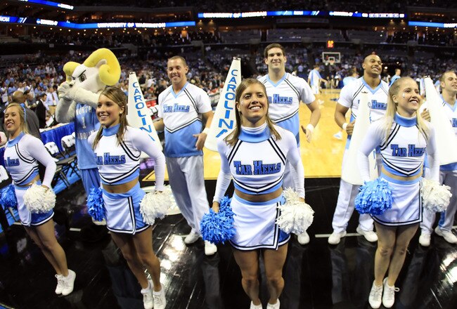 CHARLOTTE, NC - MARCH 18:  The North Carolina Tar Heels cheerleaders perform during the second round of the 2011 NCAA men's basketball tournament between the Tar Heels and the Long Island Blackbirds at Time Warner Cable Arena on March 18, 2011 in Charlotte, North Carolina.  (Photo by Streeter Lecka/Getty Images)