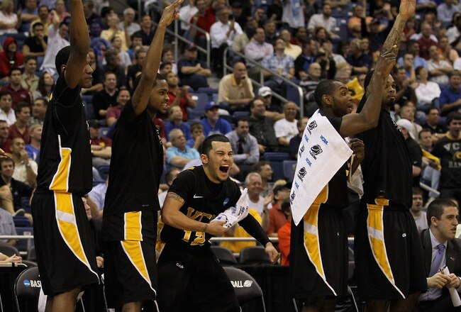 SAN ANTONIO, TX - MARCH 25:  Joey Rodriguez #12 of the Virginia Commonwealth Rams and the bench celebrate after a play against the Florida State Seminoles during the southwest regional of the 2011 NCAA men's basketball tournament at the Alamodome on March 25, 2011 in San Antonio, Texas.  (Photo by Ronald Martinez/Getty Images)