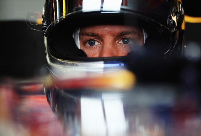MELBOURNE, AUSTRALIA - MARCH 26:  Sebastian Vettel of Germany and Red Bull Racing prepares to drive during qualifying for the Australian Formula One Grand Prix at the Albert Park Circuit on March 26, 2011 in Melbourne, Australia.  (Photo by Mark Thompson/Getty Images)