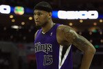 CHARLOTTE, NC - FEBRUARY 25:  DeMarcus Cousins #15 of the Sacramento Kings reacts to a call against the Charlotte Bobcats during their game at Time Warner Cable Arena on February 25, 2011 in Charlotte, North Carolina. NOTE TO USER: User expressly acknowledges and agrees that, by downloading and/or using this Photograph, User is consenting to the terms and conditions of the Getty Images License Agreement.  (Photo by Streeter Lecka/Getty Images)