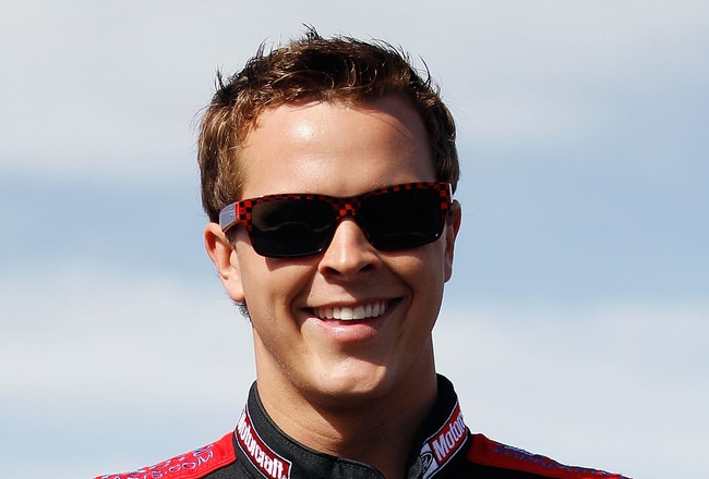AVONDALE, AZ - FEBRUARY 25:  Trevor Bayne, driver of the #21 Motorcraft/Quick Lane Ford, walks in the garage area during practice for the Subway Fresh Fit 500 at Phoenix International Raceway on February 25, 2011 in Avondale, Arizona.  (Photo by Chris Graythen/Getty Images for NASCAR)