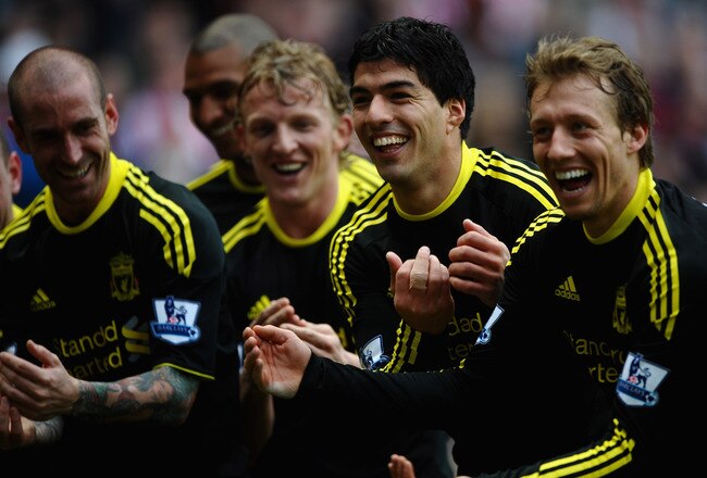SUNDERLAND, ENGLAND - MARCH 20:  Luis Suarez of Liverpool (2ndr) celebrates his goal alongside Lucas Leiva, Dirk Kuyt and Raul Meireles during the Barclays Premier League match between Sunderland and Liverpool at the Stadium of Light on March 20, 2011 in Sunderland, England.  (Photo by Laurence Griffiths/Getty Images)