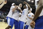 NEWARK, NJ - MARCH 27:  Josh Harrellson #55 and Stacey Poole Jr. #2 of the Kentucky Wildcats celebrates after defeating the North Carolina Tar Heels during the east regional final of the 2011 NCAA men's basketball tournament at Prudential Center on March 27, 2011 in Newark, New Jersey.  (Photo by Nick Laham/Getty Images)