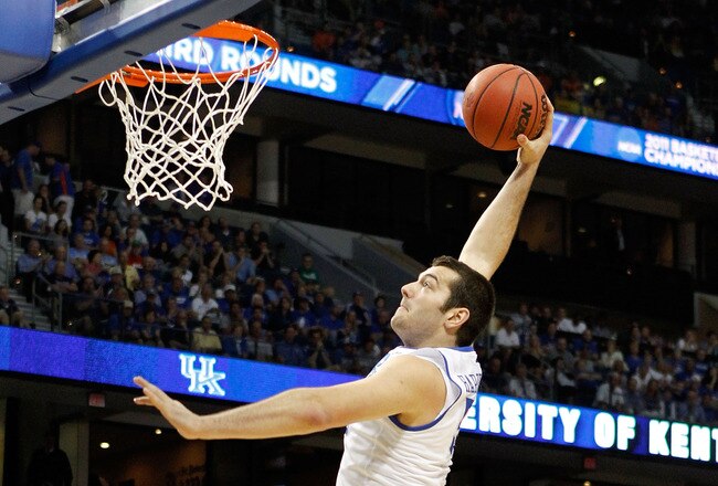 TAMPA, FL - MARCH 19:  Josh Harrellson #55 of the Kentucky Wildcats attempts a dunk against the West Virginia Mountaineers during the third round of the 2011 NCAA men's basketball tournament at St. Pete Times Forum on March 19, 2011 in Tampa, Florida.  (Photo by J. Meric/Getty Images)