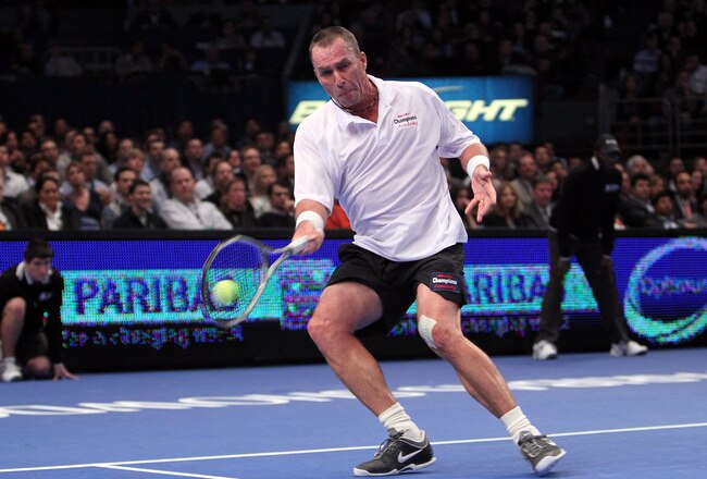 NEW YORK, NY - FEBRUARY 28:  Ivan Lendl hits a return against John McEnroe during the BNP Paribas Showdown at Madison Square Garden on February 28, 2011 in New York City.  (Photo by Nick Laham/Getty Images)