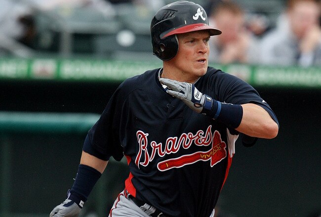 JUPITER, FL - MARCH 17:  Nate McLouth #24 of the Atlanta Braves hits a single against the Florida Marlins at Roger Dean Stadium on March 17, 2010 in Jupiter, Florida.  (Photo by Doug Benc/Getty Images)