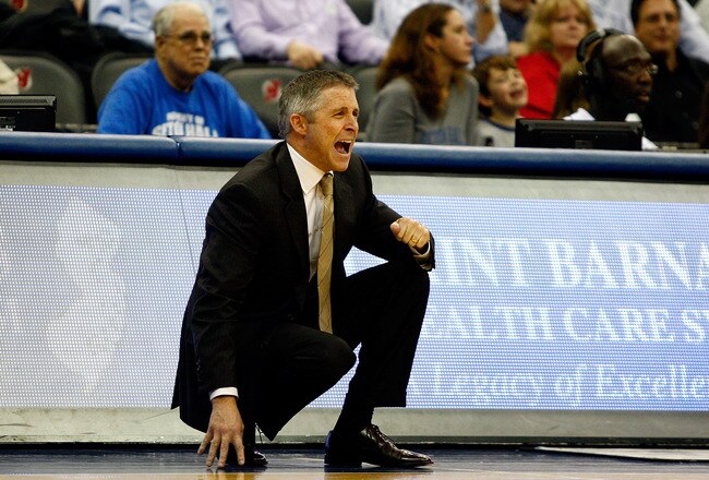 NEWARK, NJ - DECEMBER 22:  Head coach Brian Gregory of the Dayton Flyers reacts as he coaches against the Seton Hall Pirates at Prudential Center on December 22, 2010 in Newark, New Jersey.  (Photo by Chris Chambers/Getty Images)