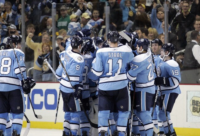 PITTSBURGH, PA - MARCH 27: The Pittsburgh Penguins celebrate their shootout victory against the Florida Panthers at Consol Energy Center on March 27, 2011 in Pittsburgh, Pennsylvania. The Penguins defeated the Panthers 2-1 in a shootout. (Photo by Justin K. Aller/Getty Images)