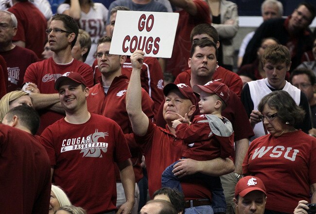 LOS ANGELES, CA - MARCH 10:  Washington State Cougars fans cheer on their team against the Washington Huskies in the quarterfinals of the 2011 Pacific Life Pac-10 Men's Basketball Tournament at Staples Center on March 10, 2011 in Los Angeles, California.  (Photo by Jeff Gross/Getty Images)