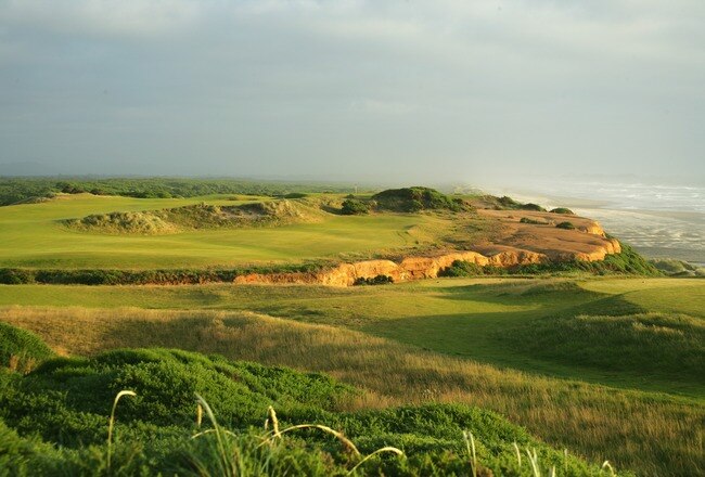 BANDON, OREGON, UNITED STATES - JUNE 23: The 363 yard par 4, 16th hole on the Bandon Dunes Course, designed by David McLay Kidd, at the Bandon Dunes Golf Resort on June 23, 2005 in Bandon, Oregon, United States.  (Photo by David Cannon/Getty Images)