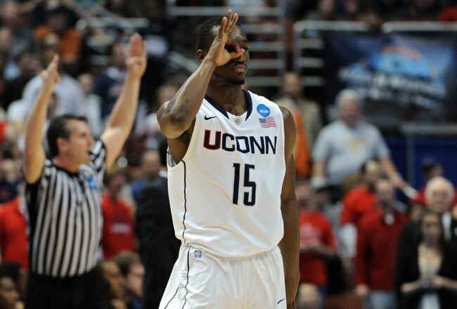 ANAHEIM, CA - MARCH 26:  Kemba Walker #15 of the Connecticut Huskies reacts after a play against the Arizona Wildcats during the west regional final of the 2011 NCAA men's basketball tournament at the Honda Center on March 26, 2011 in Anaheim, California.  (Photo by Harry How/Getty Images)