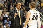 WEST LAFAYETTE, IN - JANUARY 09:  Matt Painter the Head Coach of the Purdue Boilermakers gives instructions to Ryne Smith #24 during the Big Ten Conference game against the Iowa Hawkeyes at Mackey Arena on January 9, 2011 in West Lafayette, Indiana.  Purdue won 75-52.  (Photo by Andy Lyons/Getty Images)