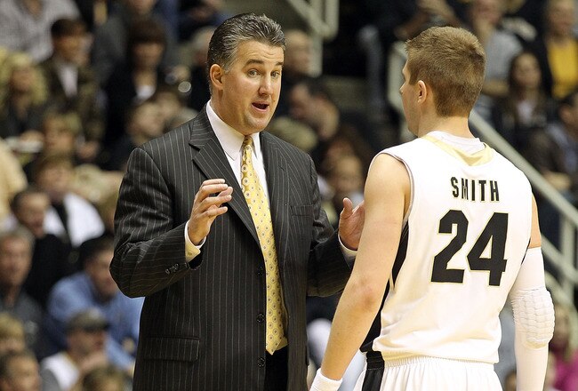 WEST LAFAYETTE, IN - JANUARY 09:  Matt Painter the Head Coach of the Purdue Boilermakers gives instructions to Ryne Smith #24 during the Big Ten Conference game against the Iowa Hawkeyes at Mackey Arena on January 9, 2011 in West Lafayette, Indiana.  Purdue won 75-52.  (Photo by Andy Lyons/Getty Images)