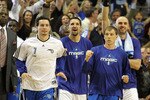 ORLANDO, FL - MAY 06:  J.J. Redick #7, Ryan Anderson #33, Jason Williams #44 and Marcin Gortat #13 of the Orlando Magic celebrate after Jameer Nelson #14 hits a desperation three-point basket with less than a second left in the third quarter to give the Magic the lead against the Atlanta Hawks in Game Two of the Eastern Conference Semifinals during the 2010 NBA Playoffs at Amway Arena on May 6, 2010 in Orlando, Florida. The Magic defeated the Hawks 112-98. NOTE TO USER: User expressly acknowledges and agrees that, by downloading and/or using this Photograph, user is consenting to the terms and conditions of the Getty Images License Agreement.  (Photo by Doug Benc/Getty Images)