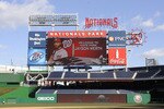 WASHINGTON, DC - DECEMBER 15:  A photo of Jayson Werth #28 of the Washington Nationals is displayed on a screen while he is introduced to the media on December 15, 2010 at Nationals Park in Washington, DC.  (Photo by Mitchell Layton/Getty Images)