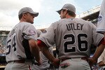 NEW YORK - JULY 14: Brad Lidge, Chase Utley of the Philadelphia Philies and Chipper Jones of the Atlanta Braves look on during batting practice for the 2008 MLB All-Star game at Yankee Stadium on July 14, 2008 in the Bronx borough of New York City.  (Photo by Chris McGrath/Getty Images)