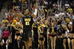 SAN ANTONIO, TX - MARCH 25:  Jamie Skeen #21 of the Virginia Commonwealth Rams and the VCU fans celebrate after defeating the Florida State Seminoles during the southwest regional of the 2011 NCAA men's basketball tournament at the Alamodome on March 25, 2011 in San Antonio, Texas. Virginia Commonwealth defeated Florida State 72-71 in overtime. (Photo by Jamie Squire/Getty Images)