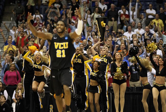 SAN ANTONIO, TX - MARCH 25:  Jamie Skeen #21 of the Virginia Commonwealth Rams and the VCU fans celebrate after defeating the Florida State Seminoles during the southwest regional of the 2011 NCAA men's basketball tournament at the Alamodome on March 25, 2011 in San Antonio, Texas. Virginia Commonwealth defeated Florida State 72-71 in overtime. (Photo by Jamie Squire/Getty Images)