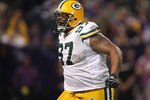 MINNEAPOLIS - NOVEMBER 09:  Defensive tackle Johnny Jolly #97 of the Green Bay Packers celebrates against the Minnesota Vikings on November 9, 2008 at the Metrodome in Mineapolis, Minnesota.  The Vikings won 28-27.  (Photo by Stephen Dunn/Getty Images)