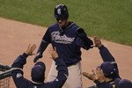 SAN FRANCISCO - OCTOBER 01:  Ryan Ludwick #47 of the San Diego Padres is congratulated by teammates after hitting a solo home run during the second inning against the San Francisco Giants October 1, 2010 in San Francisco, California.  (Photo by Justin Sullivan/Getty Images)