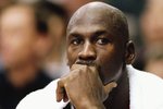 21 Nov 1997:  Guard Michael Jordan of the Chicago Bulls looks on during a game against the Los Angeles Clippers at the Los Angeles Sports Arena in Los Angeles, California.  The Bulls won the game 111-102 in double-overtime. Mandatory Credit: Todd Warshaw