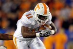 LEXINGTON, KY - NOVEMBER 28:  Bryce Brown #11 of the Tennessee Volunteers runs with the ball during the SEC game against the Kentucky Wildcats at Commonwealth Stadium on November 28, 2009 in Lexington, Kentucky.  (Photo by Andy Lyons/Getty Images)