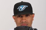 DUNEDIN, FL - FEBRUARY 20:  Ricky Romero #24 of the Toronto Blue Jays poses during photo day at Florida Auto Exchange Stadium on February 20, 2011 in Dunedin, Florida.  (Photo by Nick Laham/Getty Images)