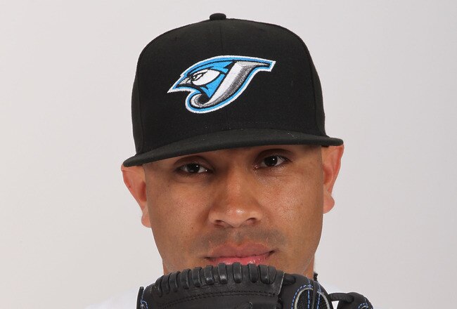 DUNEDIN, FL - FEBRUARY 20:  Ricky Romero #24 of the Toronto Blue Jays poses during photo day at Florida Auto Exchange Stadium on February 20, 2011 in Dunedin, Florida.  (Photo by Nick Laham/Getty Images)
