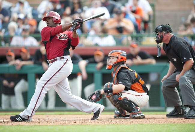 SCOTTSDALE, AZ - FEBRUARY 25: Justin Upton #10 of the Arizona Diamondbacks bats during a spring training game San Francisco Giant at Scottsdale Stadium on February 25, 2011 in Scottsdale, Arizona. (Photo by Rob Tringali/Getty Images)