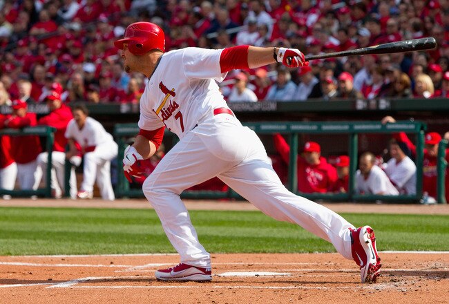 ST. LOUIS, MO - MARCH 31: Matt Holliday #7 of the St. Louis Cardinals hits an RBI single against the San Diego Padres on opening day at Busch Stadium on March 31, 2011 in St. Louis, Missouri.  (Photo by Dilip Vishwanat/Getty Images)