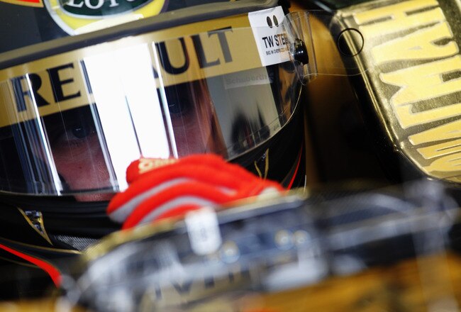 MELBOURNE, AUSTRALIA - MARCH 26:  Vitaly Petrov of Russia and Renault prepares to drive in the final practice session prior to qualifying for the Australian Formula One Grand Prix at the Albert Park Circuit on March 26, 2011 in Melbourne, Australia.  (Photo by Paul Gilham/Getty Images)