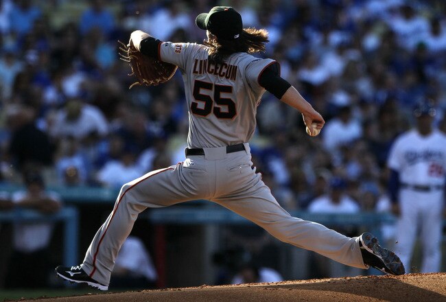 LOS ANGELES, CA - MARCH 31:  Tim Lincecum #55 of the San Francisco Giants throws a pitch against the Los Angeles Dodgers on Opening Day at Dodger Stadium on March 31, 2011 in Los Angeles, California.  (Photo by Jeff Gross/Getty Images)