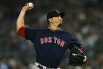 NEW YORK - SEPTEMBER 24:  Josh Beckett #19 of the Boston Red Sox pitches against the New York Yankees on September 24, 2010 at Yankee Stadium in the Bronx borough of New York City.  (Photo by Andrew Burton/Getty Images)