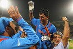 MUMBAI, INDIA - APRIL 02:  Mahendra Singh Dhoni of India celebrates after hitting the winning runs during the 2011 ICC World Cup Final between India and Sri Lanka at the Wankhede Stadium on April 2, 2011 in Mumbai, India.  (Photo by Tom Shaw/Getty Images)