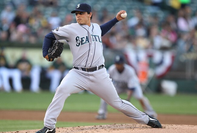 OAKLAND, CA - APRIL 02:  Jason Vargas #38 of the Seattle Mariners pitches against the Oakland Athletics during a Major League Baseball game at the Oakland-Alameda County Coliseum on April 2, 2011 in Oakland, California.  (Photo by Jed Jacobsohn/Getty Images)