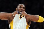 LOS ANGELES, CA - MARCH 20:  Kobe Bryant #24 of the Los Angeles Lakers celebrates his basket in the last minute on way to an 84-80 win over the  Portland Trail Blazers at the Staples Center on March 20, 2011 in Los Angeles, California.  NOTE TO USER: User expressly acknowledges and agrees that, by downloading and or using this photograph, User is consenting to the terms and conditions of the Getty Images License Agreement.  (Photo by Harry How/Getty Images)