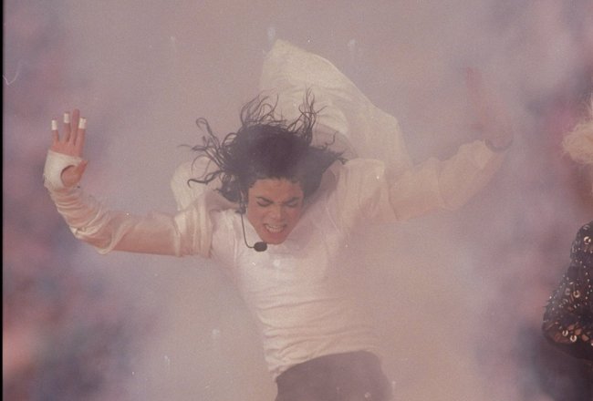 31 Jan 1993: Singer Michael Jackson performs during halftime at Super Bowl XXVII between the Dallas Cowboys and the Buffalo Bills at the Rose Bowl in Pasadena, California. The Cowboys won the game, 52-17.