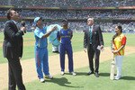 MUMBAI, INDIA - APRIL 02:  MS Dhoni of India tosses the coin for the first time with Kumar Sangakkara of Sri Lanka looking on during the 2011 ICC World Cup Final between India and Sri Lanka at Wankhede Stadium on April 2, 2011 in Mumbai, India.  (Photo by Hamish Blair/Getty Images)