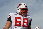 PASADENA, CA - JANUARY 01:  Offensive lineman Gabe Carimi #68 of the Wisconsin Badgers warms up prior to playing the TCU Horned Frogs in the 97th Rose Bowl game on January 1, 2011 in Pasadena, California.  (Photo by Stephen Dunn/Getty Images)