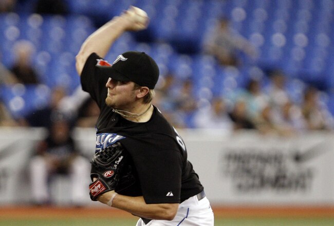 TORONTO, ON - SEPTEMBER 28: Kyle Drabek #4 of the Toronto Blue Jays throws agianst the New York Yankees during an MLB game at the Rogers Centre September 28, 2010 in Toronto, Ontario, Canada. (Photo by Abelimages/Getty Images)