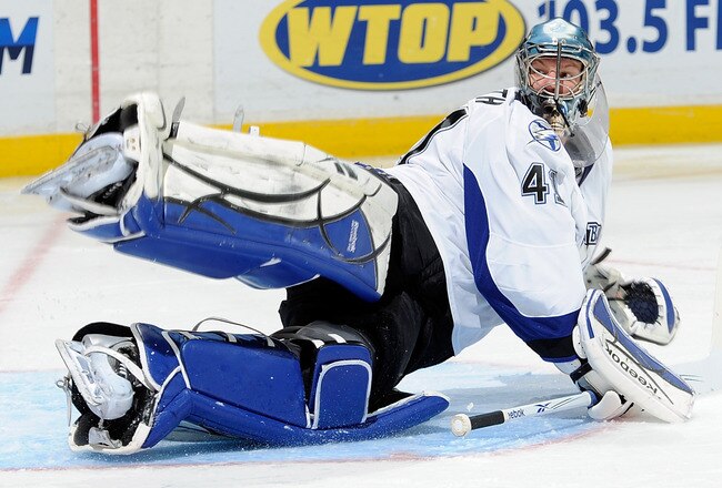 WASHINGTON - NOVEMBER 26:  Mike Smith #41 of the Tampa Bay Lightning allows a goal during the second period of the game against the Washington Capitals at the Verizon Center on November 26, 2010 in Washington, DC.  (Photo by Greg Fiume/Getty Images)