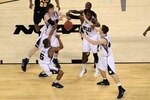 HOUSTON, TX - APRIL 02:  Rob Brandenberg #23 of the Virginia Commonwealth Rams fights for the ball against Ronald Nored #5, Andrew Smith #44, Matt Howard #54 and Shelvin Mack #1 of the Butler Bulldogs during the National Semifinal game of the 2011 NCAA Division I Men's Basketball Championship at Reliant Stadium on April 2, 2011 in Houston, Texas.  (Photo by Streeter Lecka/Getty Images)