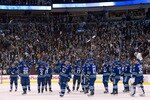 VANCOUVER, CANADA - MARCH 31: The Vancouver Canucks salut their fans after defeating the Los Angeles Kings in NHL action on March 31, 2011 at Rogers Arena in Vancouver, BC, Canada.  (Photo by Rich Lam/Getty Images)