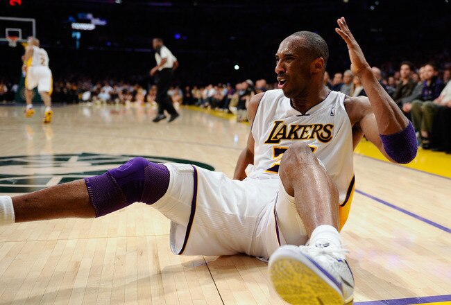 LOS ANGELES, CA - APRIL 03:  Kobe Bryant #24 of the Los Angeles Lakers reacts after missing a basket against the Denver Nuggets during the NBA basketball game at Staples Center on April 3, 2011 in Los Angeles, California. NOTE TO USER: User expressly acknowledges and agrees that, by downloading and or using this photograph, User is consenting to the terms and conditions of the Getty Images License Agreement.  (Photo by Kevork Djansezian/Getty Images)