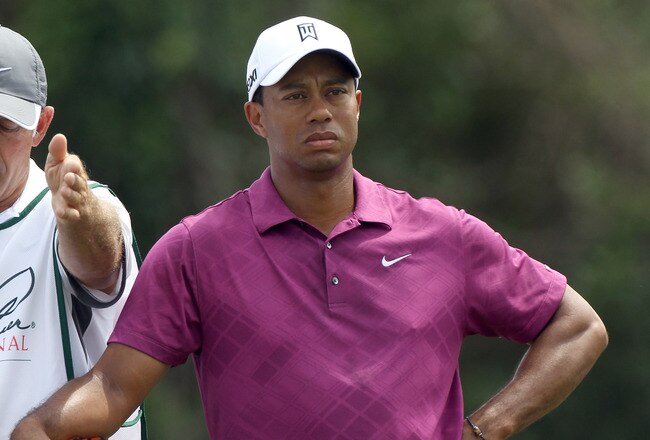 ORLANDO, FL - MARCH 26:  Tiger Woods (R) and caddie Steve Williams look over a shot on the 7th hole during the third round of the Arnold Palmer Invitational presented by MasterCard at the Bay Hill Club and Lodge on March 26, 2011 in Orlando, Florida.  (Photo by Sam Greenwood/Getty Images)