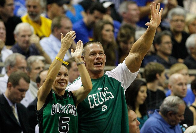 ORLANDO, FL - MAY 18:  Pro Wrestler John Cena cheeers for the Boston Celtics against of the Orlando Magic in Game Two of the Eastern Conference Finals during the 2010 NBA Playoffs at Amway Arena on May 18, 2010 in Orlando, Florida.  NOTE TO USER: User expressly acknowledges and agrees that, by downloading and/or using this Photograph, user is consenting to the terms and conditions of the Getty Images License Agreement.  (Photo by Kevin C. Cox/Getty Images)