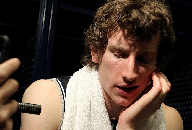HOUSTON, TX - APRIL 04:  Matt Howard #54 of the Butler Bulldogs talks to the media after losing to the Connecticut Huskies in the National Championship Game of the 2011 NCAA Division I Men's Basketball Tournament at Reliant Stadium on April 4, 2011 in Houston, Texas.  (Photo by Ronald Martinez/Getty Images)