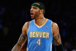 LOS ANGELES, CA - APRIL 03:  Kenyon Martin #4 of the Denver Nuggets celebrates after scoring a basket against the Los Angeles Lakers during the NBA basketball game at Staples Center on April 3, 2011 in Los Angeles, California. NOTE TO USER: User expressly acknowledges and agrees that, by downloading and or using this photograph, User is consenting to the terms and conditions of the Getty Images License Agreement.  (Photo by Kevork Djansezian/Getty Images)